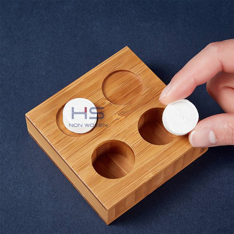 https://www.hsnonwoven.com/bamboo-tray-for-portable-mini-magic-compressed-towel-product/